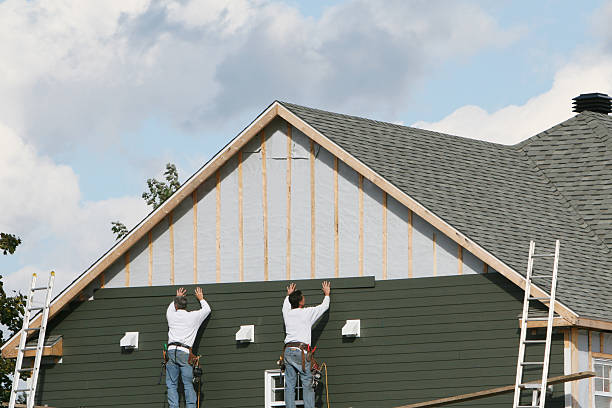 Professional Emergency Siding Repair technician working in Lewistown, OH